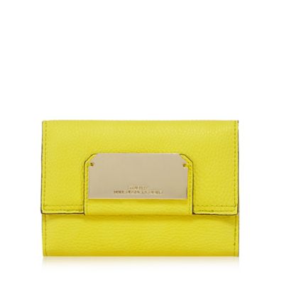 Yellow flap over wallet